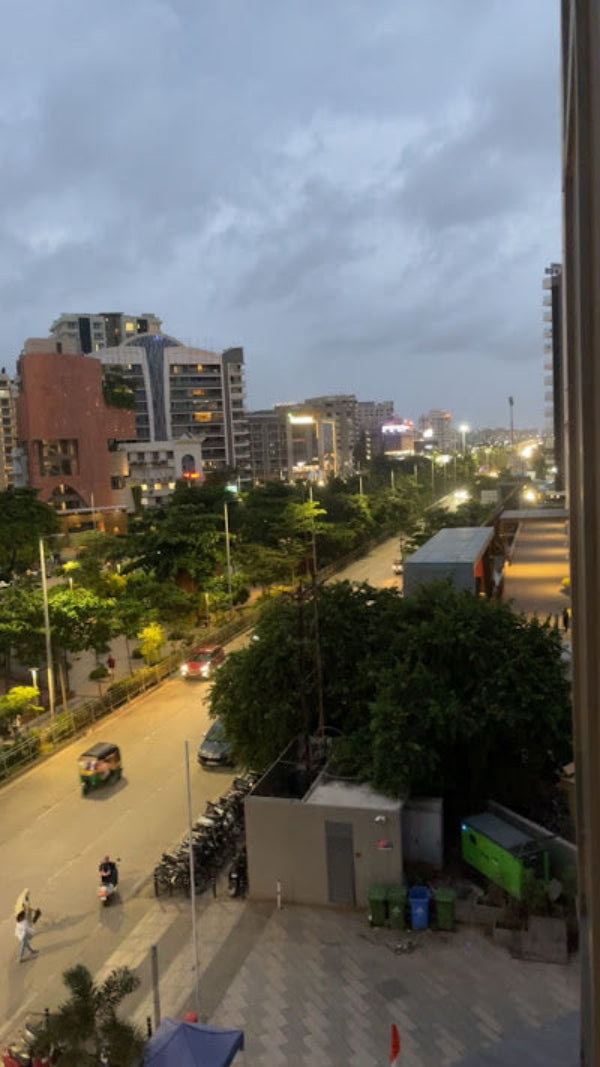 Cityscape with buildings and street at dusk